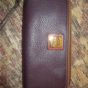 Dooney & Bourke Pebbled Leather Double Zipper Wallet in Plum
